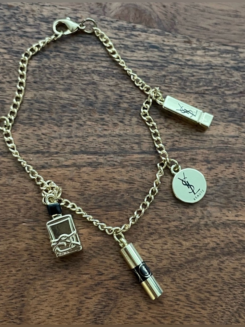 YVES SAINT LAURENT Charm Bracelet & Plumping Lip Oil Gloss Bundle - Picture 3 of 11